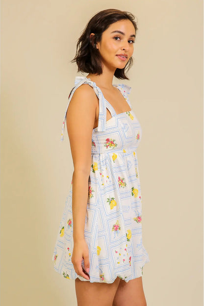 Woman wearing a floral dress with a beige background