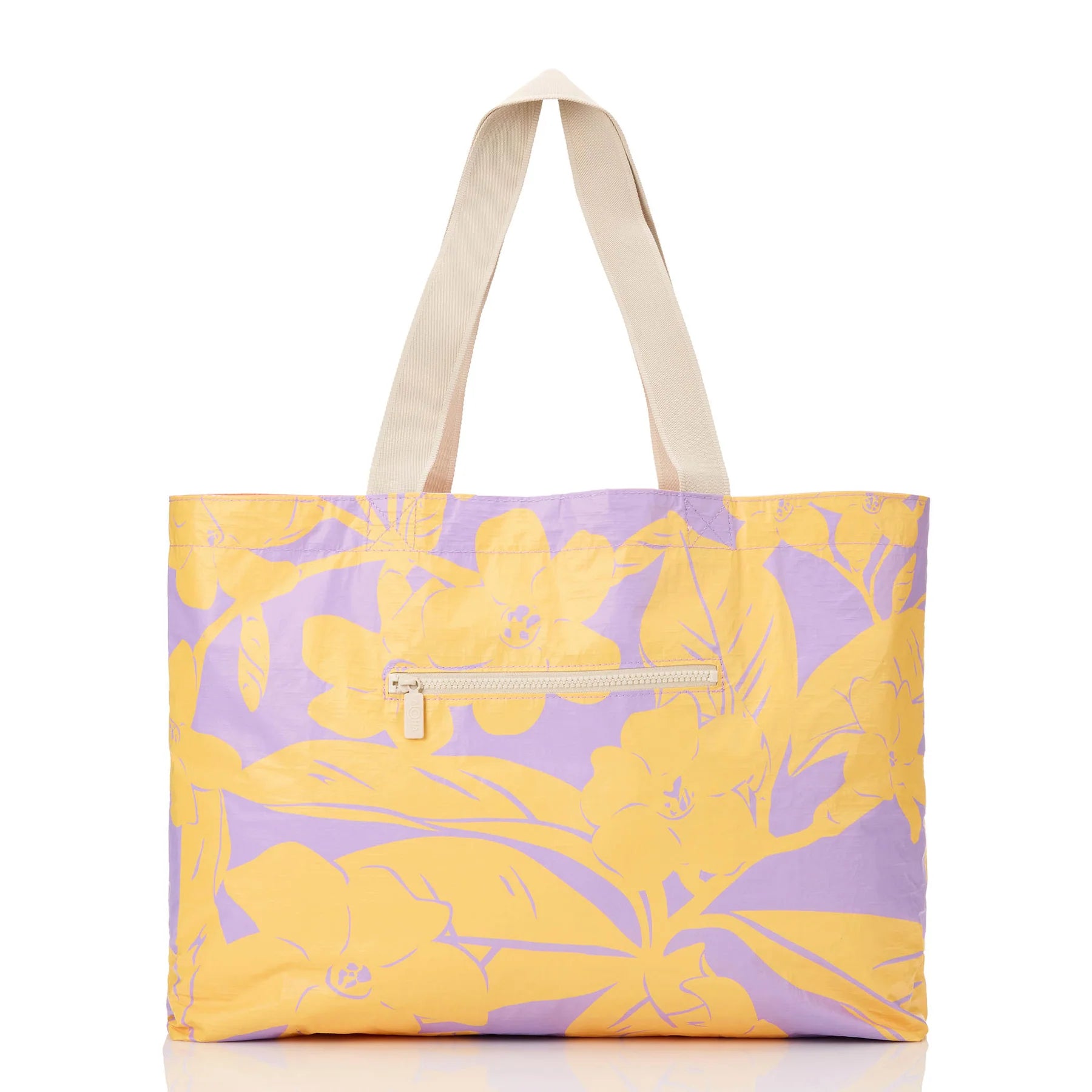 Tote bag with yellow and purple floral pattern on a white background
