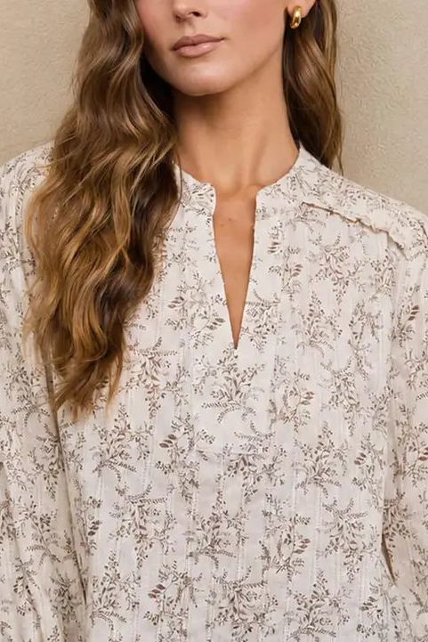 woman in floral blouse