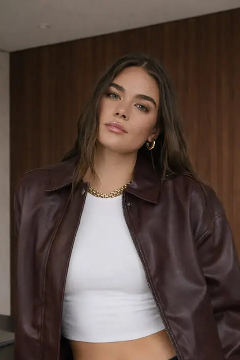 woman in leather jacket