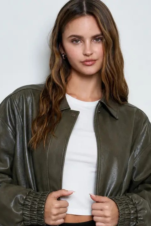 woman in leather jacket