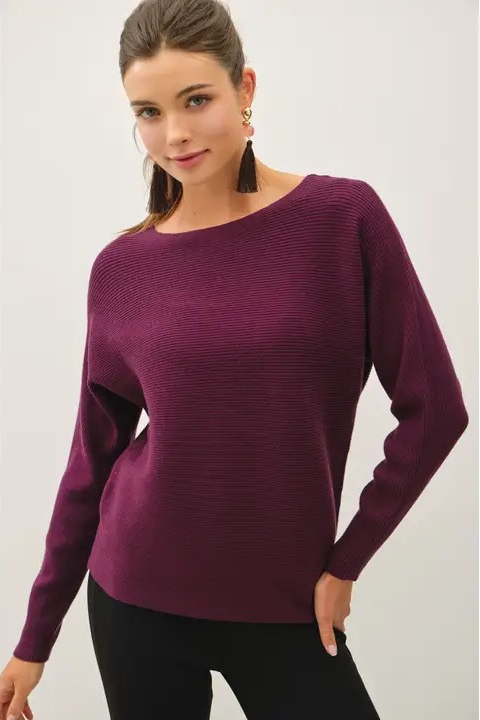 woman in sweater and jeans