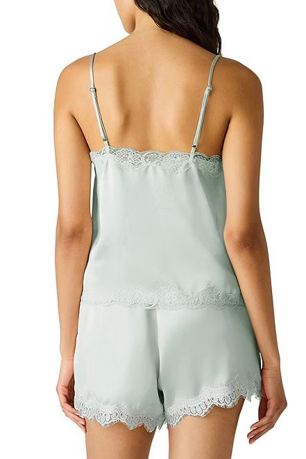 Light blue lace-trimmed nightgown on a white background