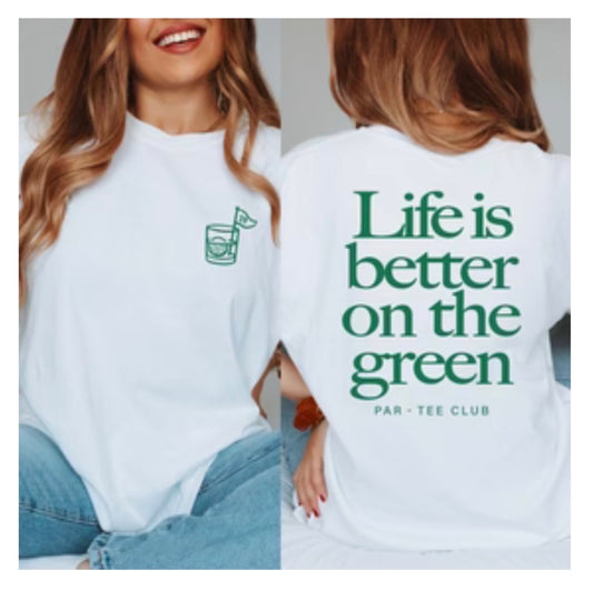 woman wearing life is better on the green tee