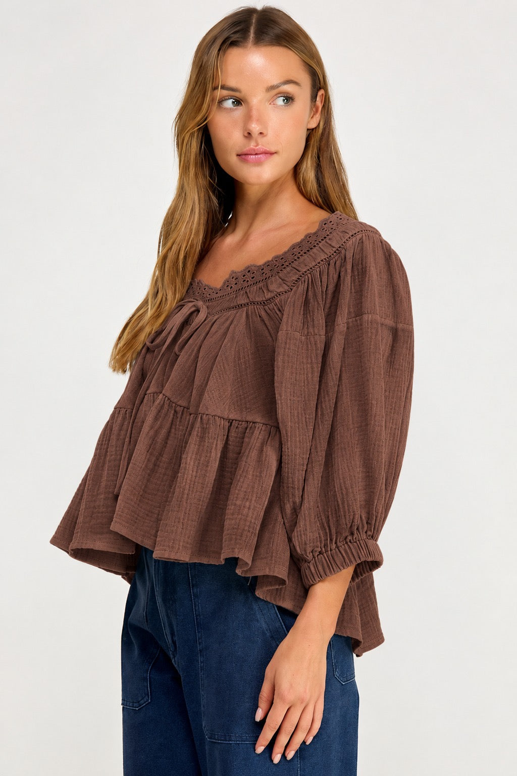 woman in lace blouse
