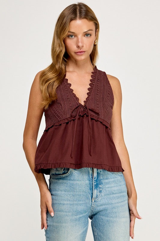 woman in lace tank and jeans