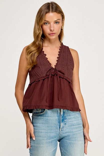woman in lace tank and jeans