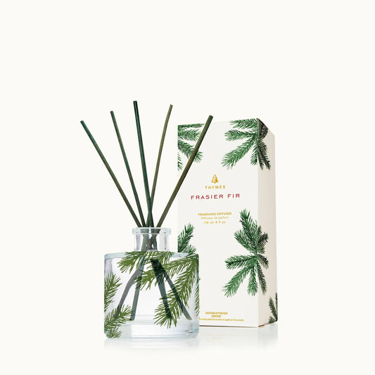 Frasier Fir diffuser set with glass bottle and packaging on a white background