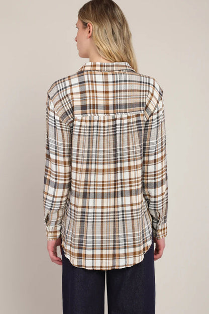 woman wearing plaid shirt