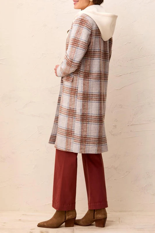 woman wearing plaid coat