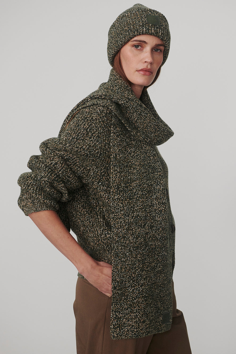 woman wearing scarf and hat