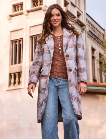 woman wearing plaid coat 