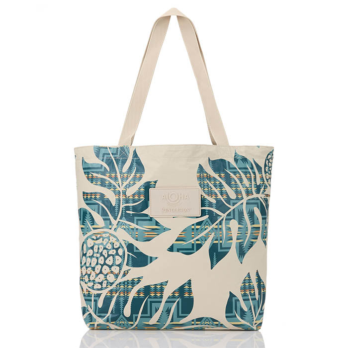 Tote bag with leaf pattern and brand logo on a white background