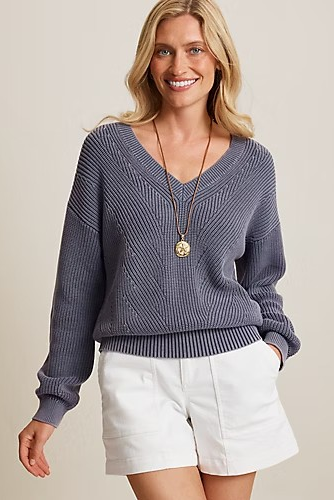 woman in blue sweater 