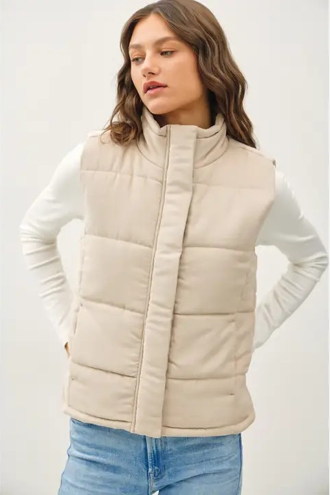 woman wearing puffer vest 